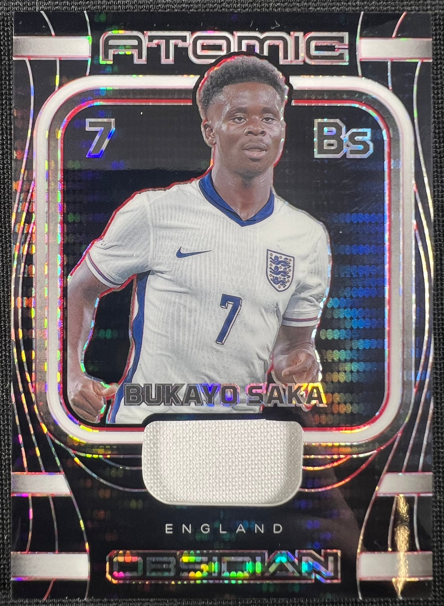 Bukayo Saka 2023-24 Panini Obsidian Atomic Red #AM-BSA /49